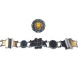 An early 20th century silver hardstone bracelet and a late Victorian Scottish silver citrine and