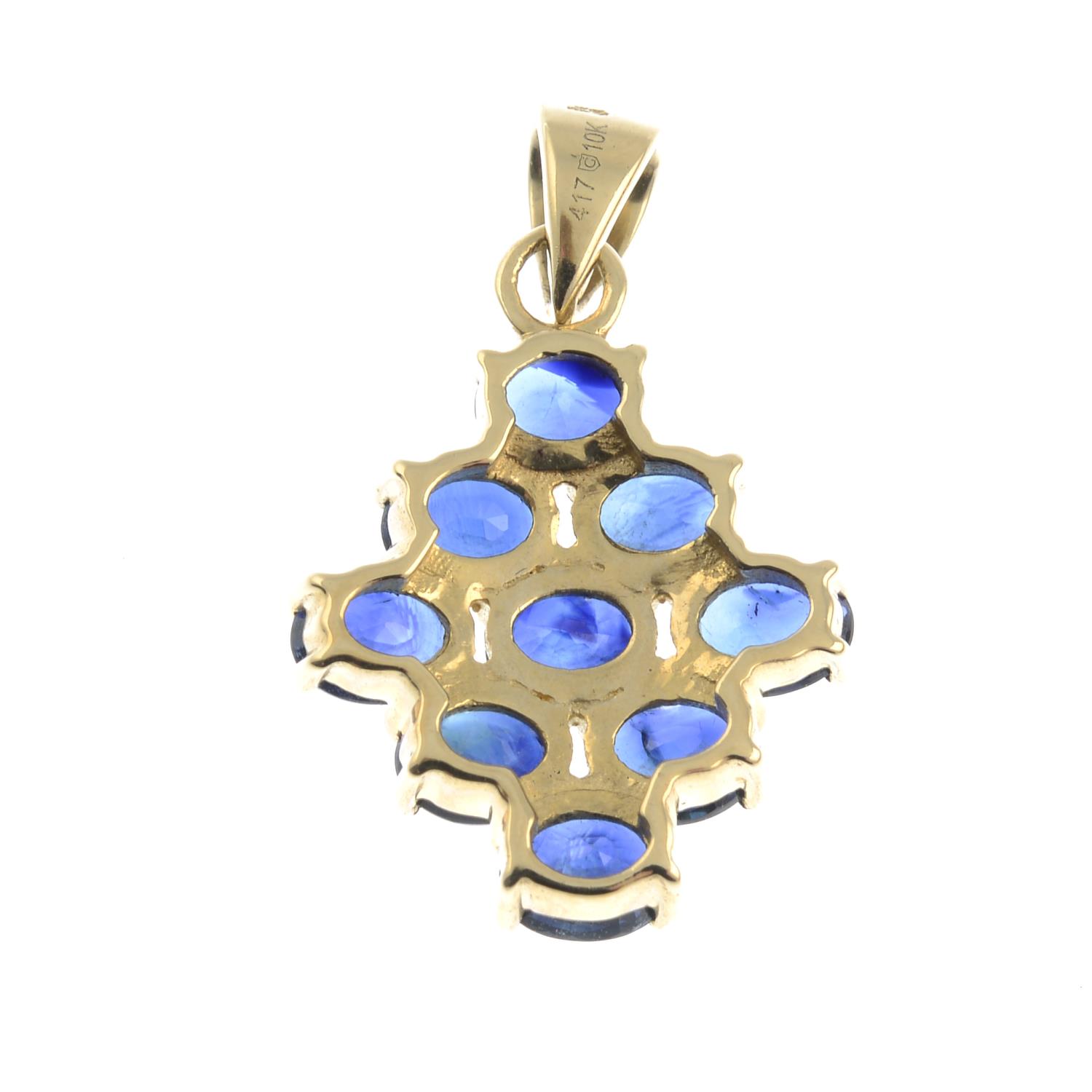 A 9ct gold sapphire cluster pendant.Total sapphire weight 2.7cts. - Image 2 of 3