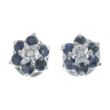 A pair of 9ct gold diamond and sapphire cluster earrings.Hallmarks for 9ct gold.Diameter 0.7cms.