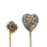 Early 20th century silver bi-colour stickpin, length of stickpin head 1.2cms, 1.3gms.