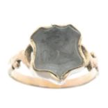 A carved rock crystal intaglio signet ring.Ring size L1/2.