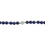 A lapis lazuli, emerald and cubic zirconia bracelet.Length 19cms.