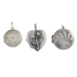 A selection of lockets and charm bracelets.