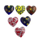 One-hundred-and-twenty vintage milliefiori glass hearts and cabochons.