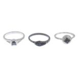 Six vari-cut diamond dress rings.Stamped 925.