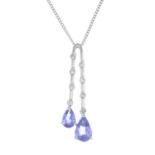 A tanzanite and diamond pendant, with chain.Stamped 750.