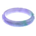 A carved jade bangle.Inner diameter 6cms.