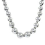 A silver bead necklace, by Tiffany & Co.
