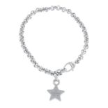 A silver bracelet with a star charm, by Gucci.Signed Gucci.