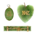 A selection of nephrite jewellery, to include five pendants and one brooch.