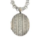 A late Victorian silver locket and chain.Length of locket 6.2cms.