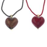 Two glass pendants and three pairs of earrings.One red glass heart pendant and two sets of