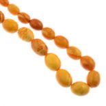 A graduated amber necklace.Amber beads measuring 1 to 2.3cms.