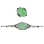 An Arts and Crafts silver jade floral brooch,