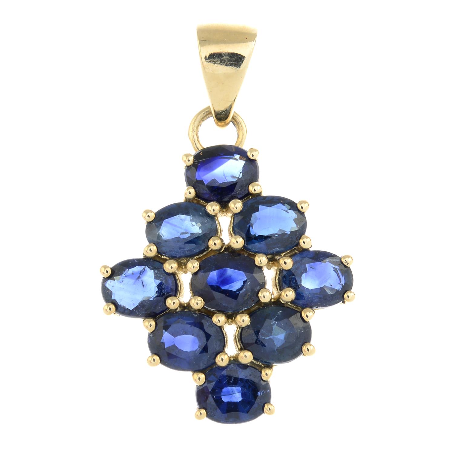 A 9ct gold sapphire cluster pendant.Total sapphire weight 2.7cts.