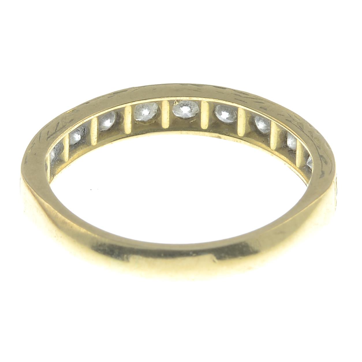 A 18ct gold diamond set half hoop eternity ring.Estimated total diamond weight 0.66ctStamped 750. - Image 2 of 2