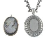 A silver locket, with chain and a mother-of-pearl cameo brooch.