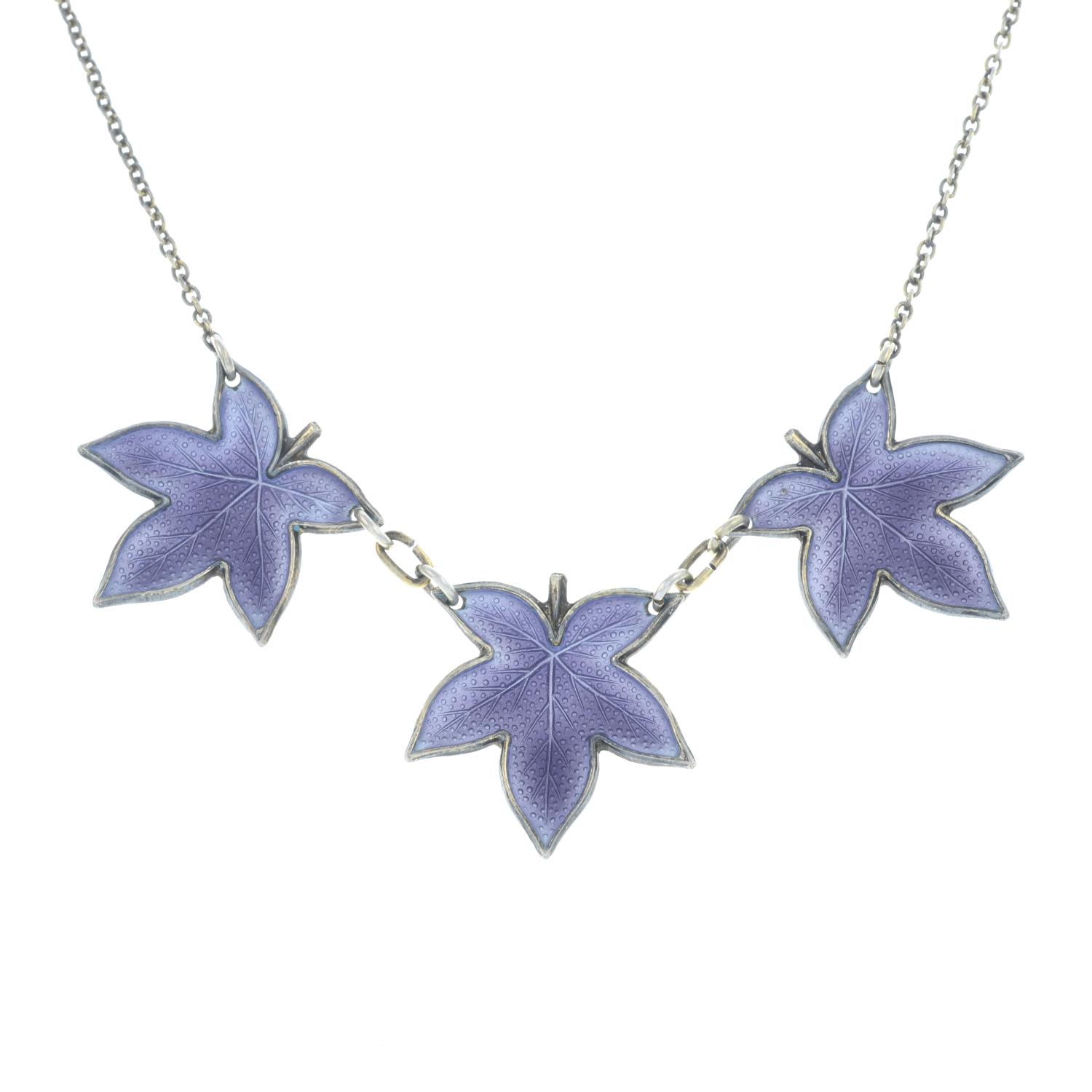 An enamel maple leaf necklace.Stamped 925.