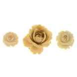 A selection of antique floral carved ivory jewellery,