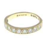 A 18ct gold diamond set half hoop eternity ring.Estimated total diamond weight 0.66ctStamped 750.