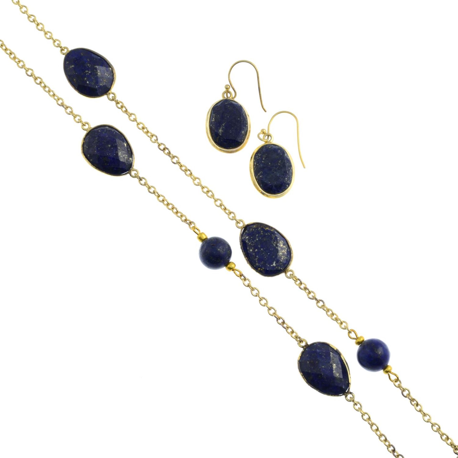 A lapis lazuli necklace and earrings.Earrings stamped 925.Length of necklace 124cms.