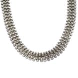 A late Victorian silver collar necklace and a similar base metal example.Lengths 34 and 48cms.