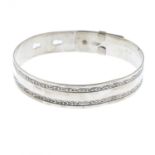 A bangle.Stamped sterling silver.Inner diameter 6.6cms.