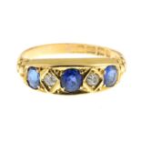 An Edwardian 18ct gold sapphire and diamond ring.Estimated total diamond weight 0.10ct.