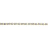 A 9ct gold diamond bracelet.Total diamond weight 0.15ct, stamped to mount.