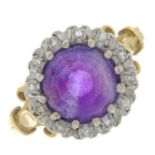 An 18ct gold amethyst and diamond cluster ring.Estimated total diamond weight 0.10ct.