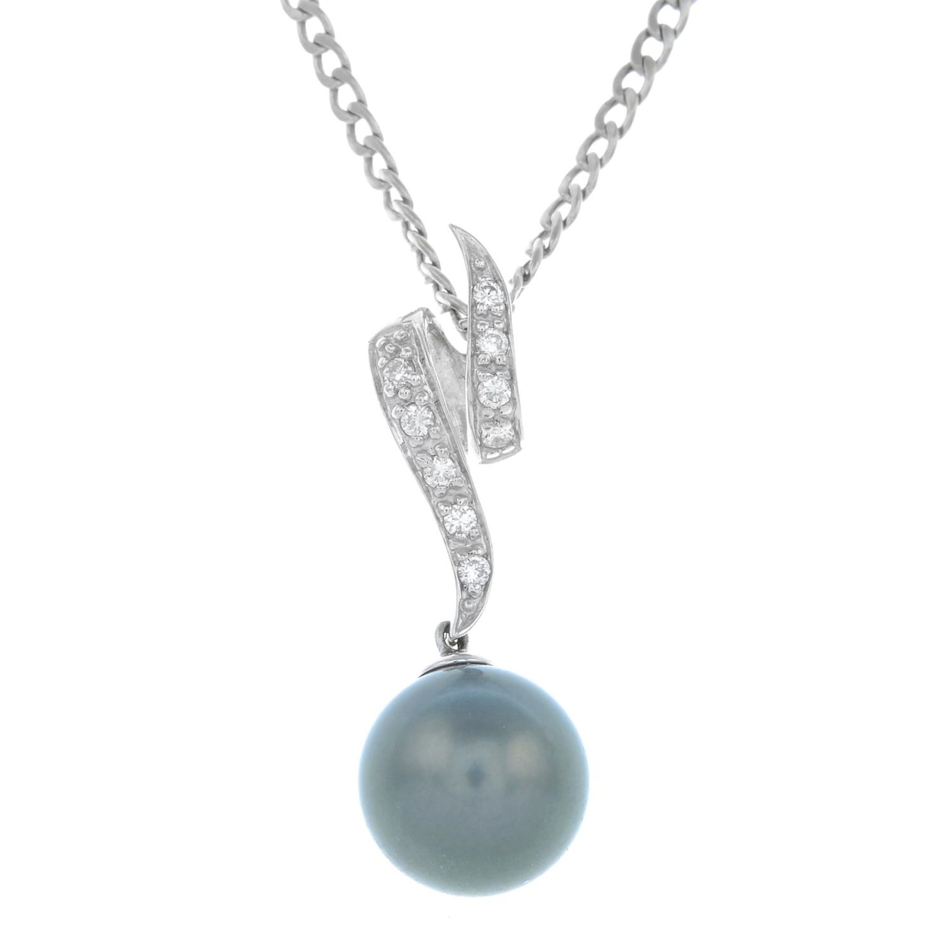 A 9ct gold cultured pearl and diamond pendant,