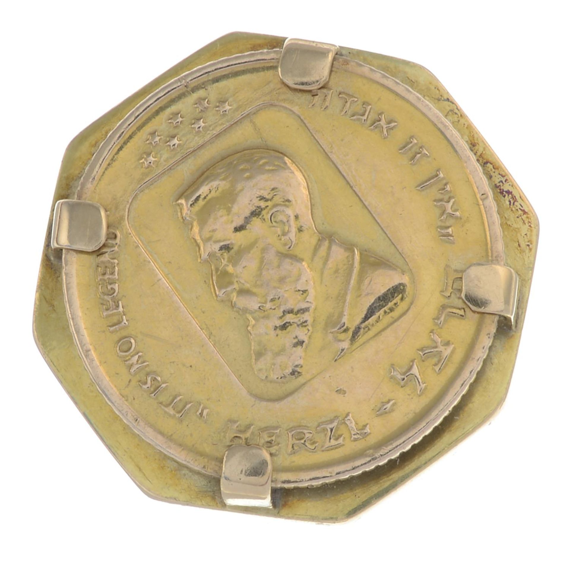 A mounted South African coin dress ring.