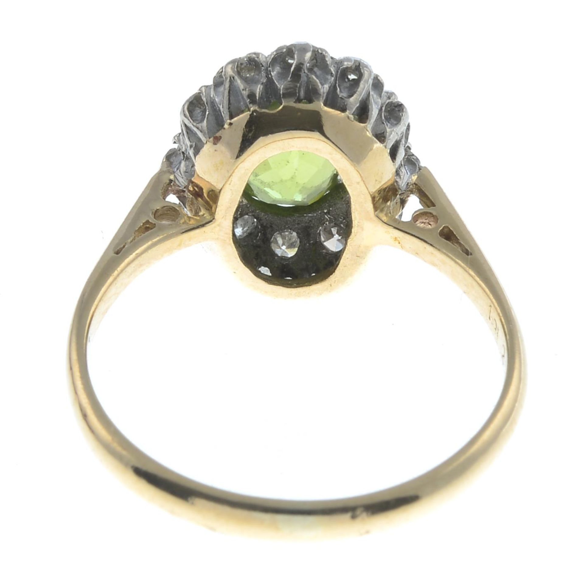 A peridot and single-cut diamond cluster ring.Estimated total diamond weight 0.20ct.Stamped - Image 2 of 2