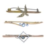 Four brooches, to include a 15ct gold seed pearl foliate brooch.Three with hallmarks for 15ct or