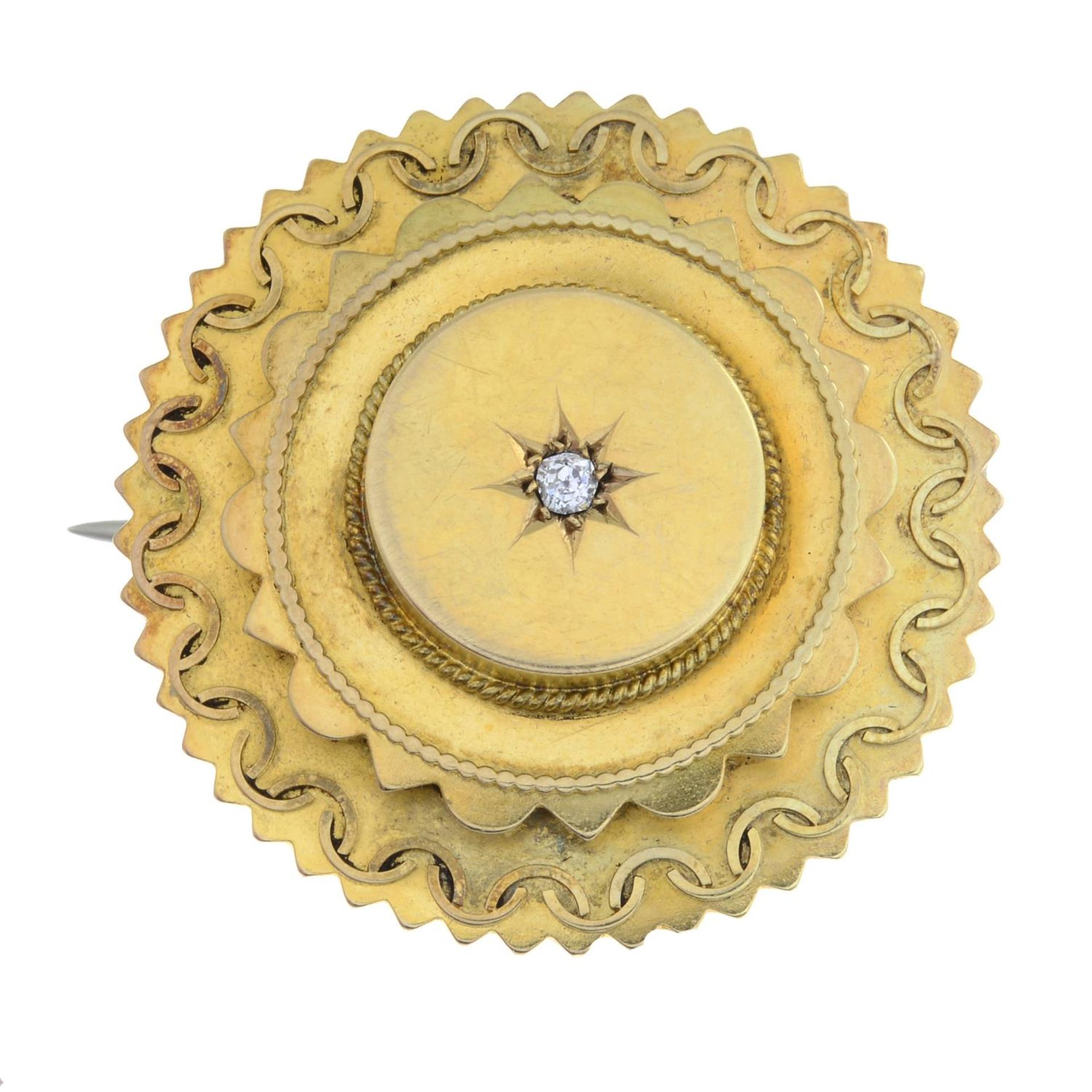 A late 19th century 15ct gold diamond brooch.Stamped 15CT.