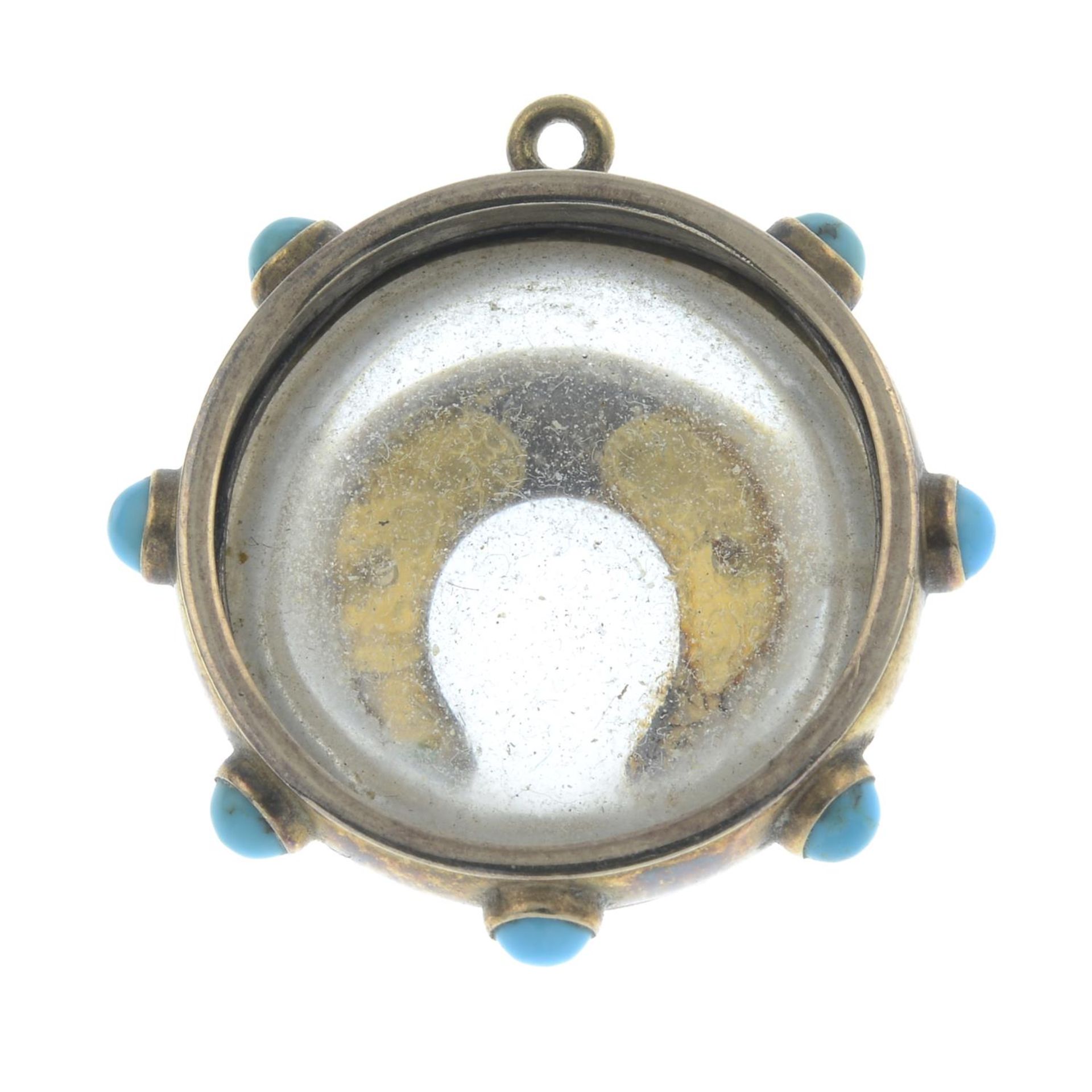 A mid to late 19th century rock crystal and turquoise pendant.Length 3.3cms. - Image 2 of 2