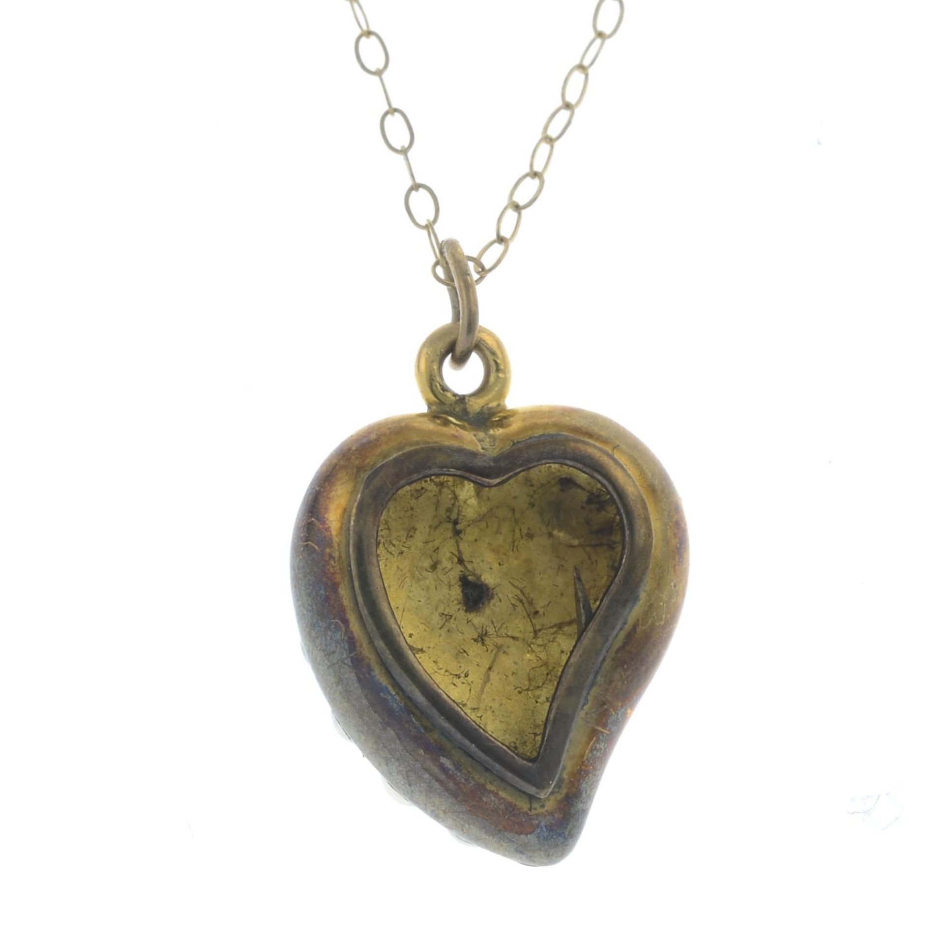An early 20th century split pearl heart locket, with chain.Length of pendant 2.2cms. - Image 2 of 2