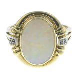 An opal cabochon and diamond dress ring.Approximate opal dimensions 13.5 by 10.1 by 3.4mms.Stamped