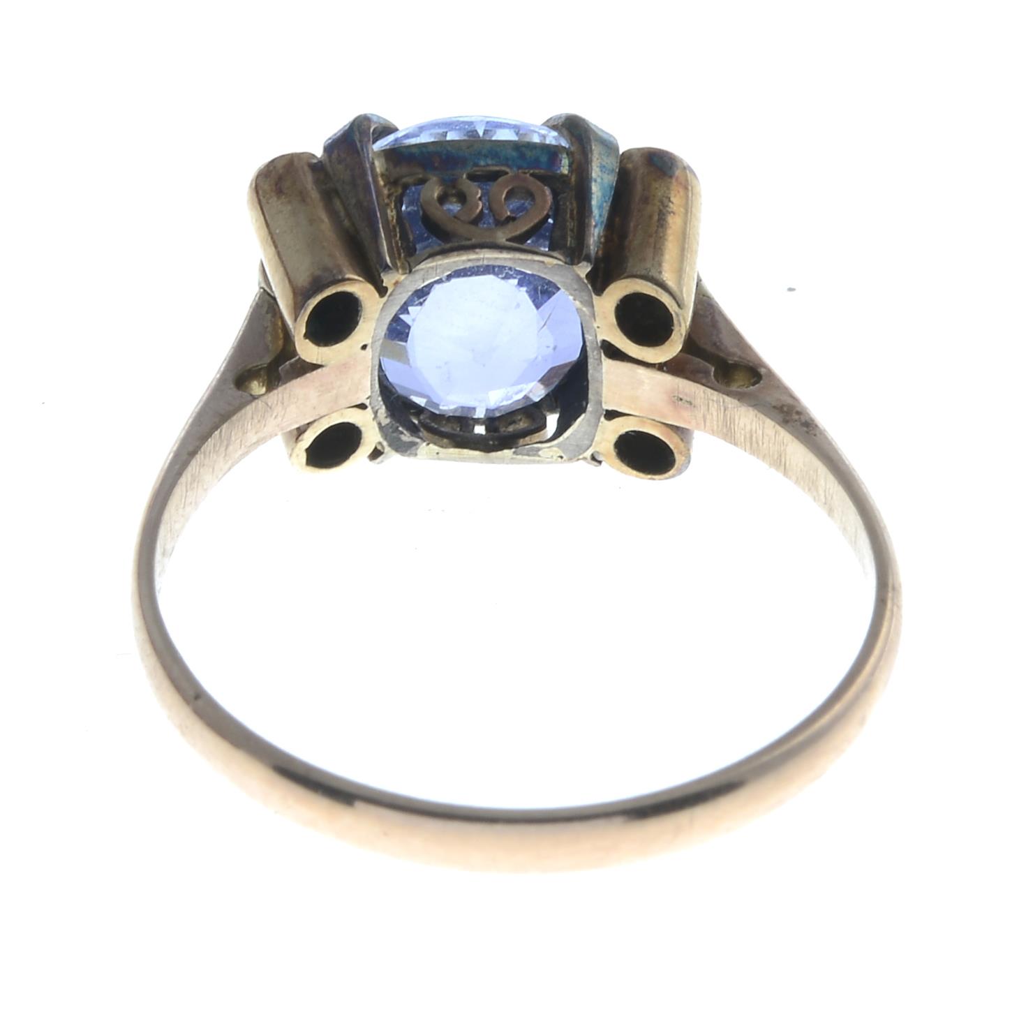 A sapphire and white sapphire dress ring.Principal sapphire calculated weight 3.25cts, - Image 2 of 3