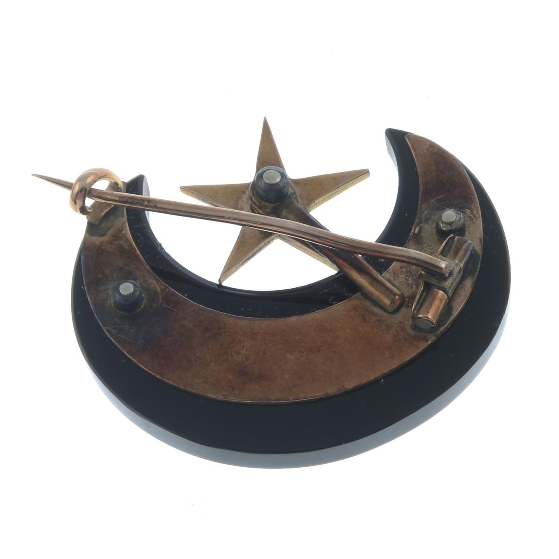 A late Victorian gold, onyx and split pearl crescent and star mourning brooch. - Image 2 of 2