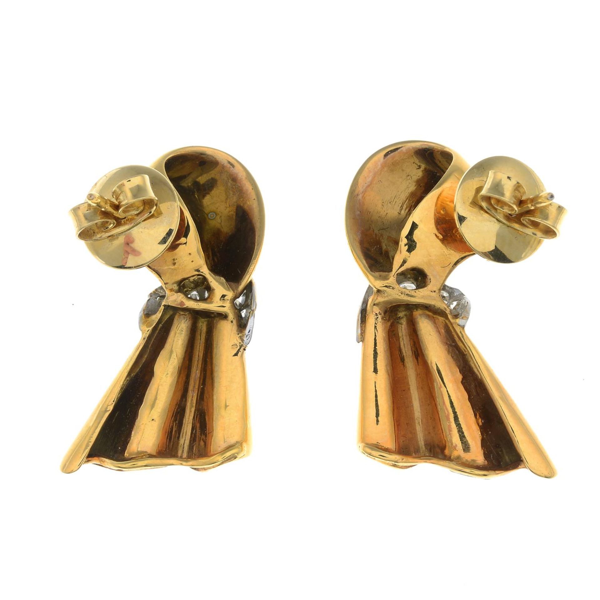 A pair of mid 20th century diamond earrings, each depicting a ribbon. - Image 2 of 2