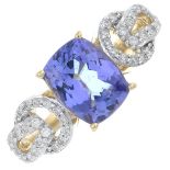 An 18ct gold tanzanite and diamond dress ring.Tanzanite weight 2.15cts.