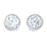 A pair of diamond stud earrings.Estimated total diamond weight 0.35ct, H-I colour, P1 clarity.