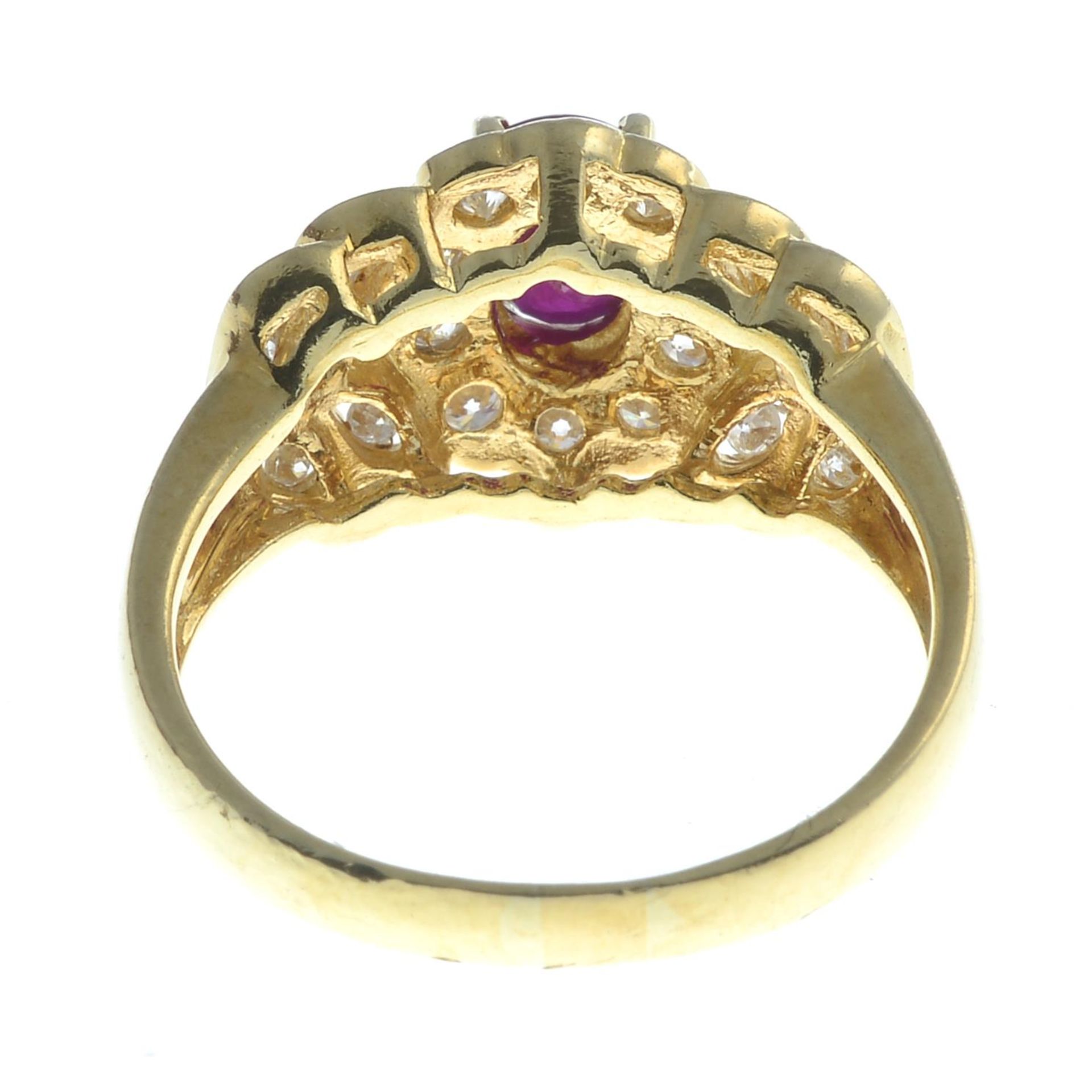 A ruby and diamond floral cluster ring.Estimated total diamond weight 0.60ct, - Image 2 of 3