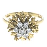 A 1960s 18ct gold diamond cluster ring.Estimated total diamond weight 0.35ct.