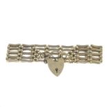 A 9ct gold gate-link bracelet, gathered at a 9ct gold padlock clasp.