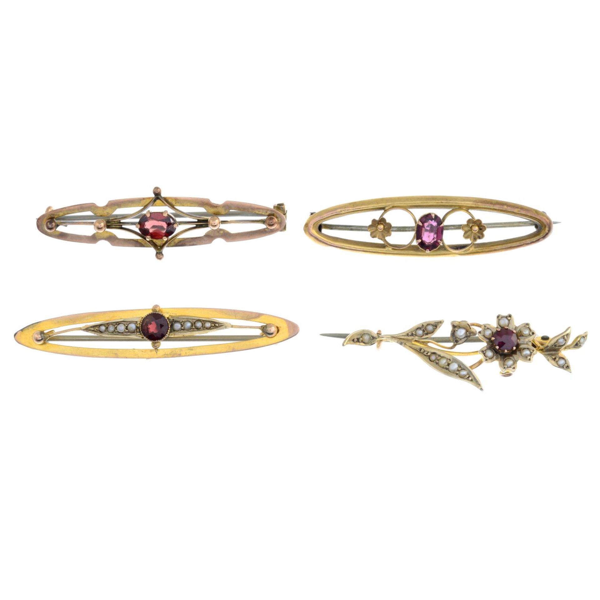 Four early 20th century gold garnet and split pearl brooches.Lengths 4.2 to 4.3cms.
