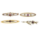 Four early 20th century gold garnet and split pearl brooches.Lengths 4.2 to 4.3cms.