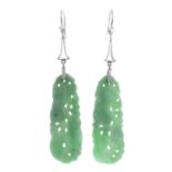 A pair of carved jade drop earrings.Length 6.1cms.