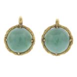 A pair of jade cabochon earrings.Diameter 1.2cms.